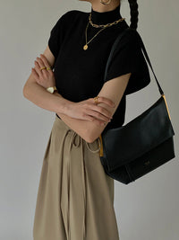 Oriana Extended Shoulder Sleeveless High Neck Knit Top