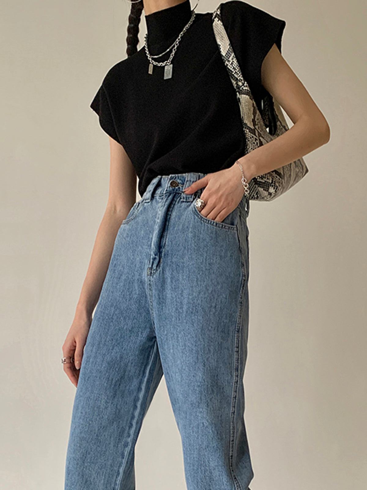 Oriana Extended Shoulder Sleeveless High Neck Knit Top