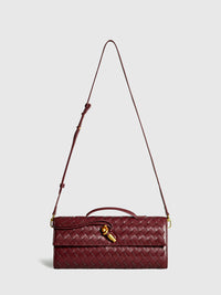 Delphine Long Woven Top Handle Twist Lock Clutch
