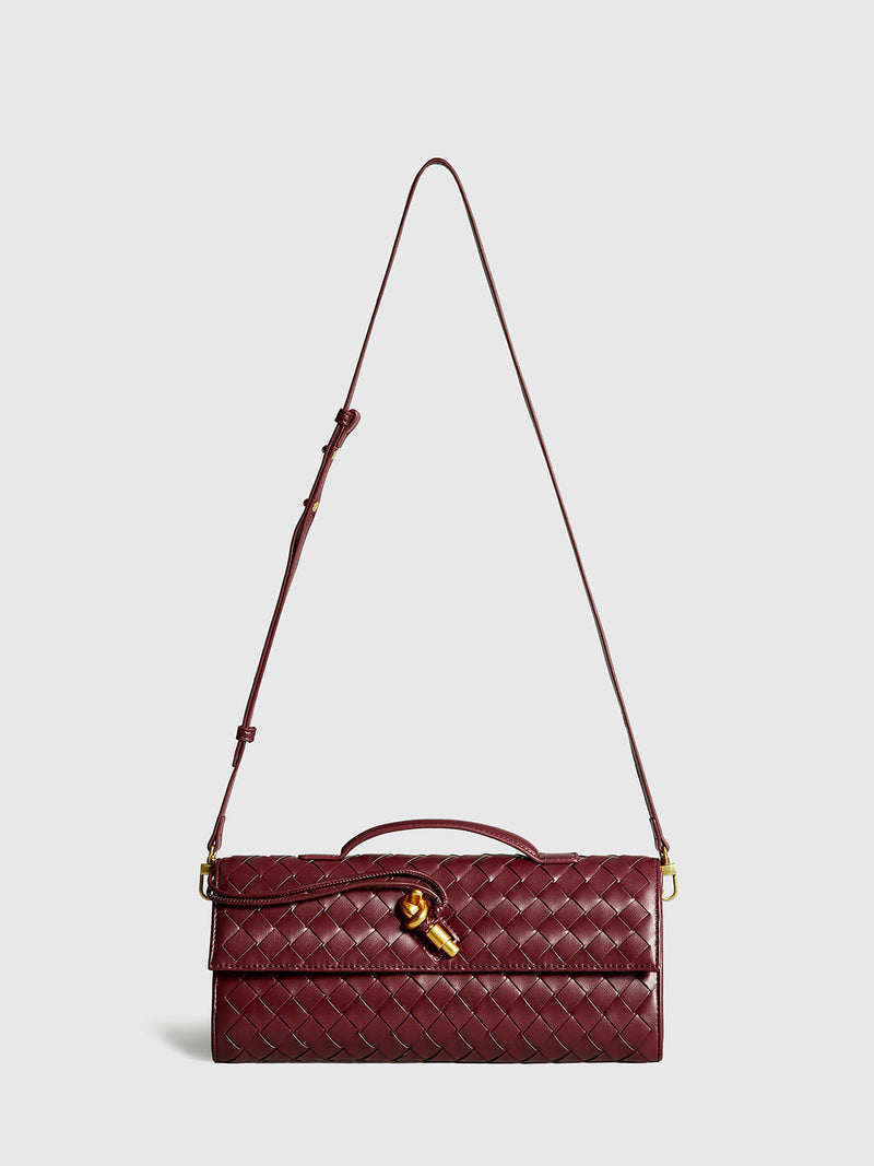 Delphine Long Woven Top Handle Twist Lock Clutch