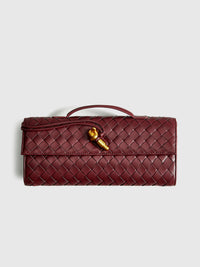 Delphine Long Woven Top Handle Twist Lock Clutch